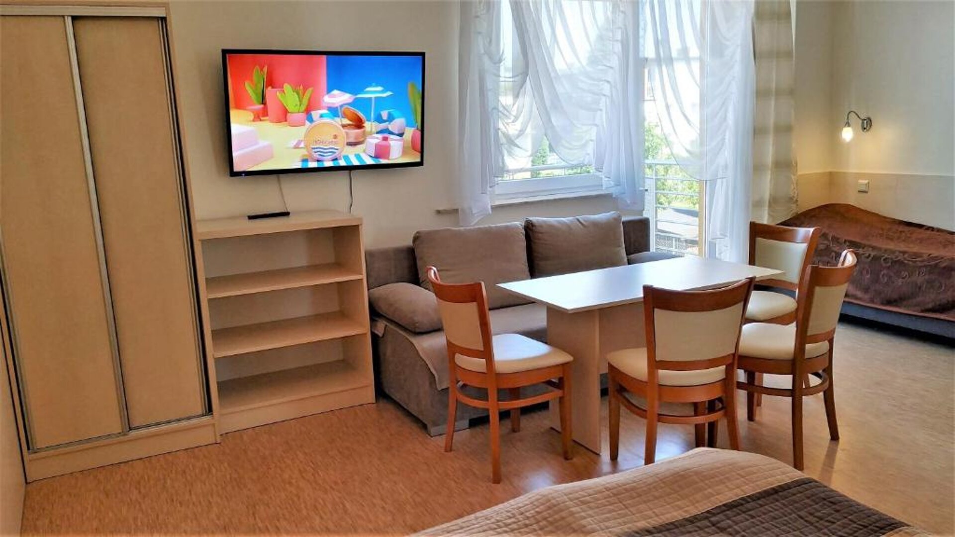 Apartament z balkonem i aneksem kuchennym
